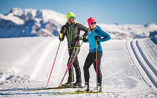 A cross-country skiing couple