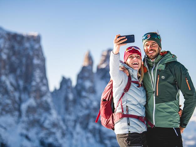 Two winter hikers take a selfie